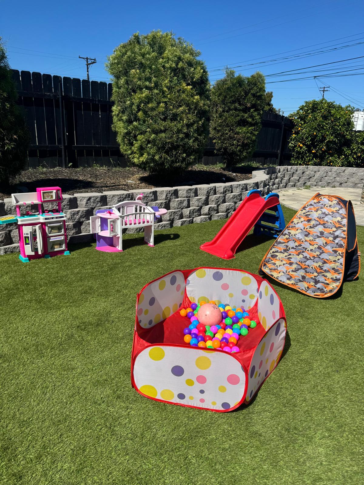 Colorful indoor classroom with activity table and learning rug